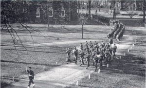 image of The Army Specialist Training Unit Marching across Campus