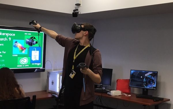 Student experiencing Virtual Reality in the MakerSpace