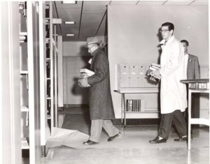 iamge of faculty moving books 1961